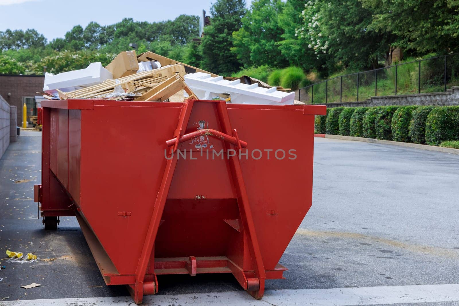 Container trash dumpster is used for recycling of construction waste in caring environment with solid household waste