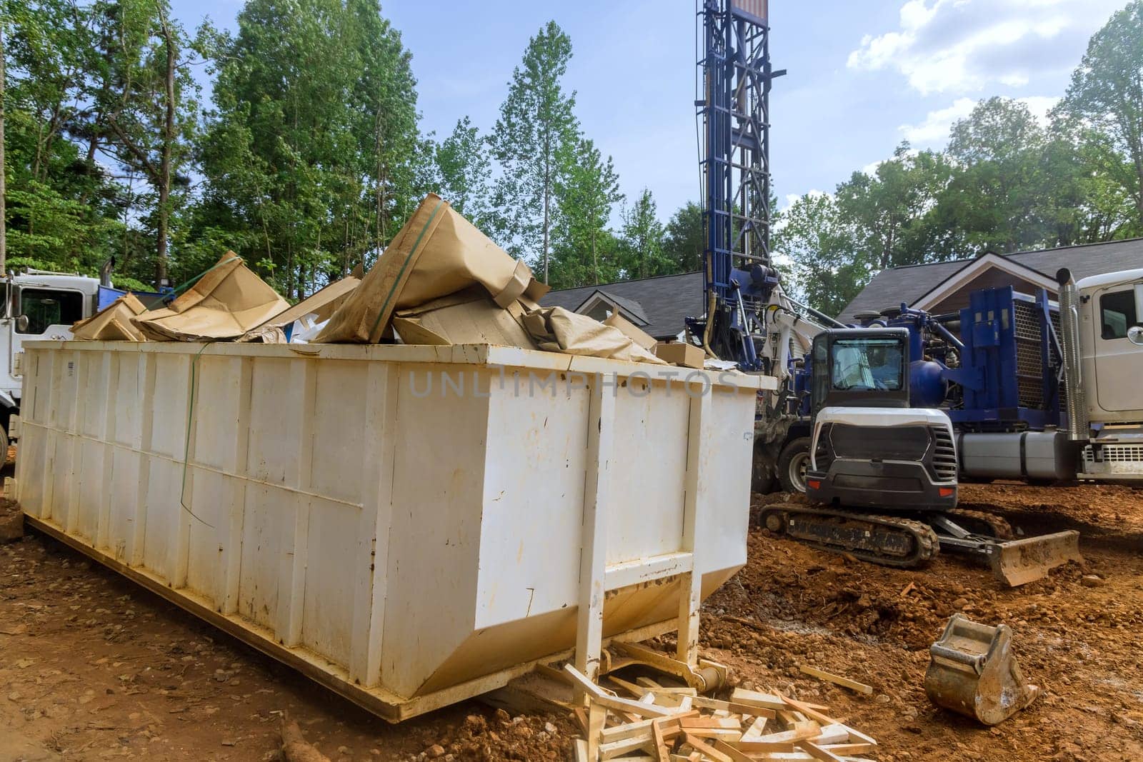 Providing containers for disposal of trash recycling construction waste in manner that respects environment