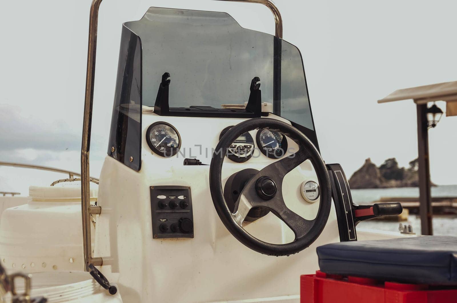 The steering wheel of a sailing yacht and a navigation device by PopOff