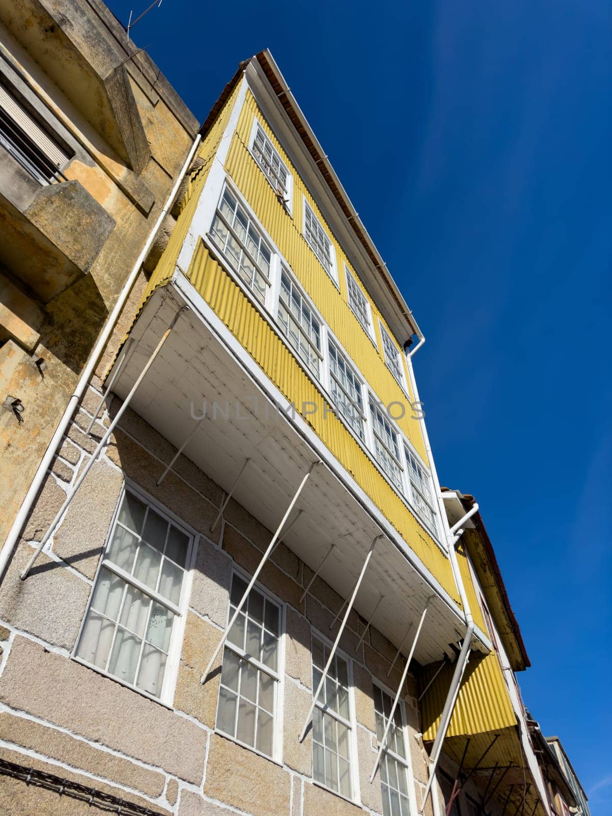 Picturesque townscape of Vila Real overlooking typical narrow streets on warm sunny spring day, Portugal .