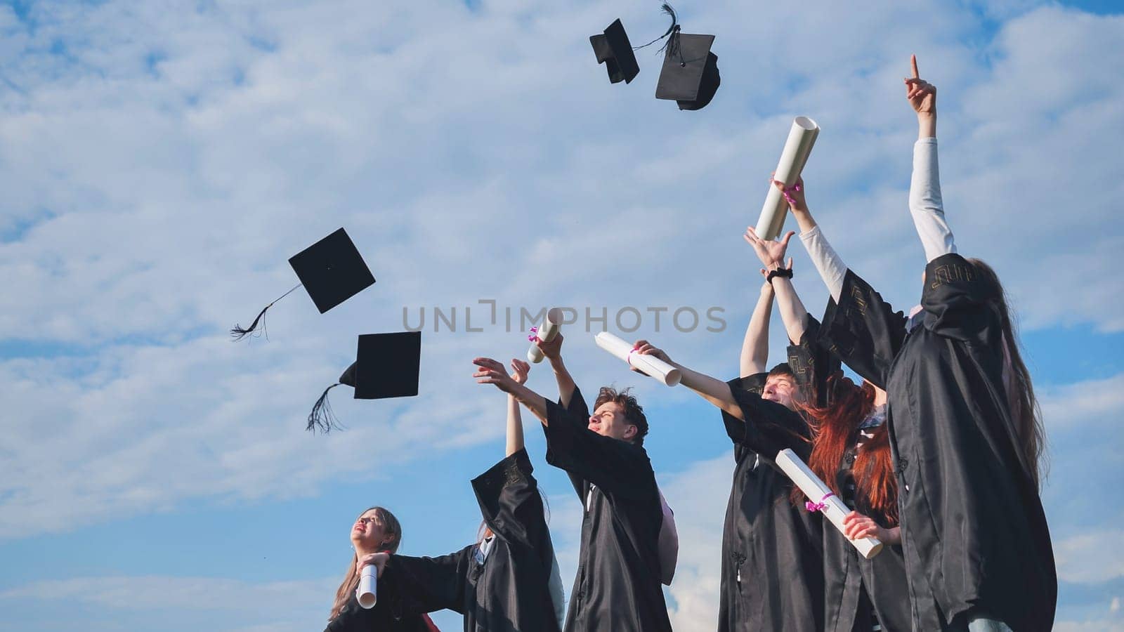 Graduation Caps Thrown in the Air by DovidPro