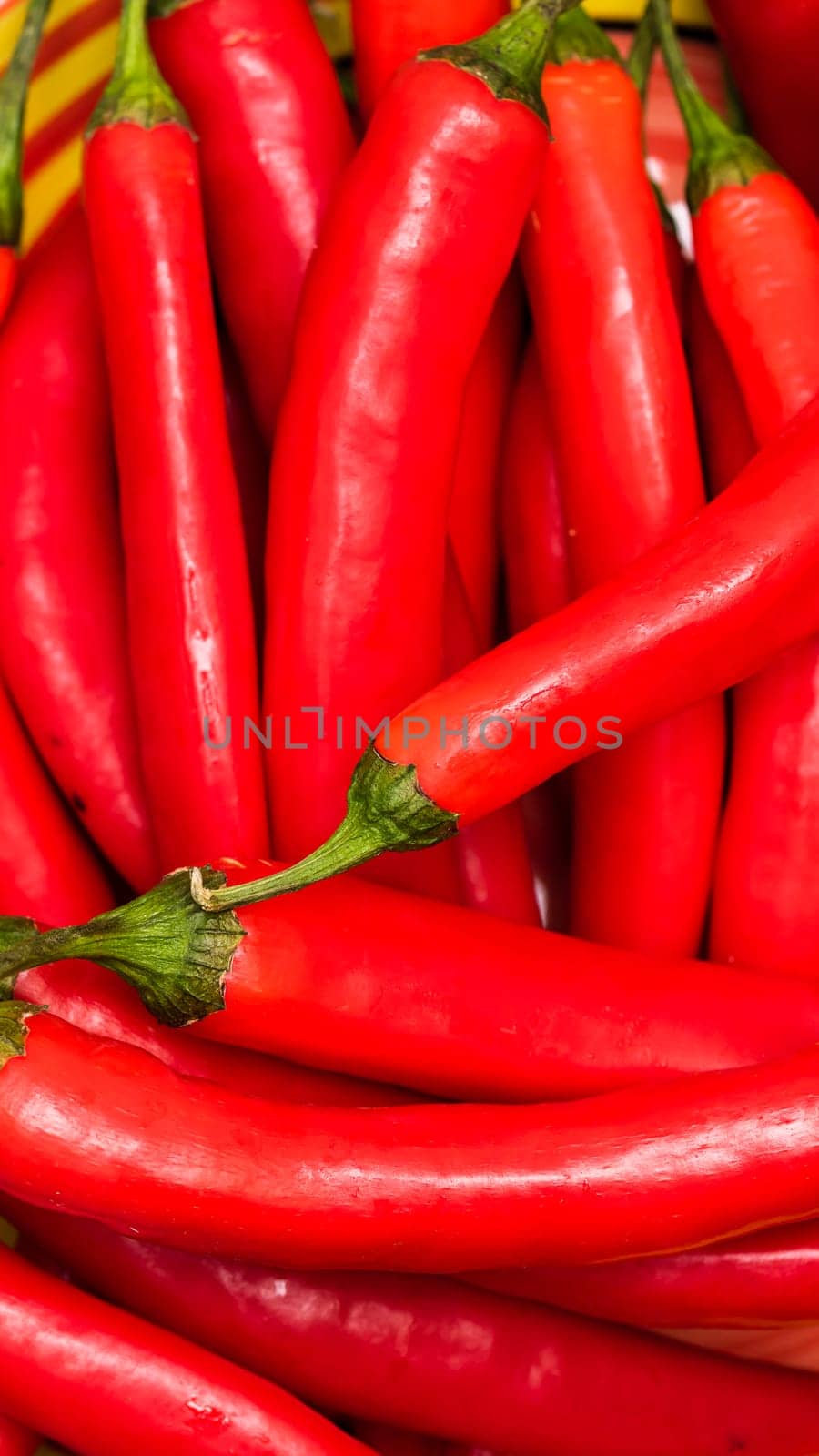 Red hot chilli peppers, close up. Background of red chilies