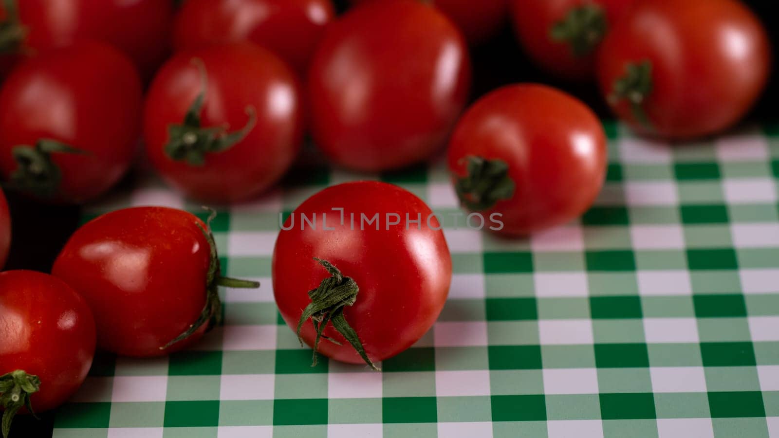 Selective focus on ripe delicious cherry tomatoes, close up