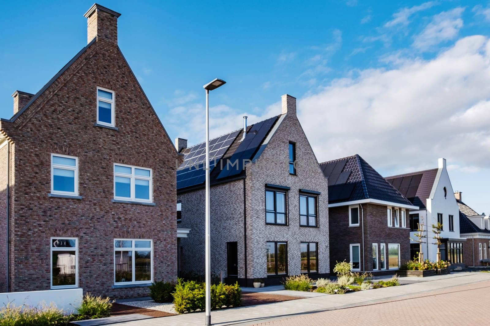 Dutch Suburban area with modern family houses, newly build moder by fokkebok