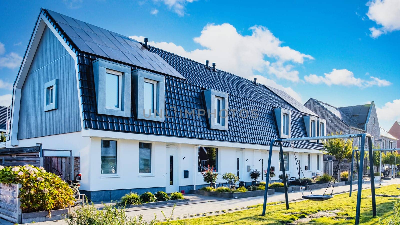 Dutch Suburban area with modern family houses, newly build moder by fokkebok