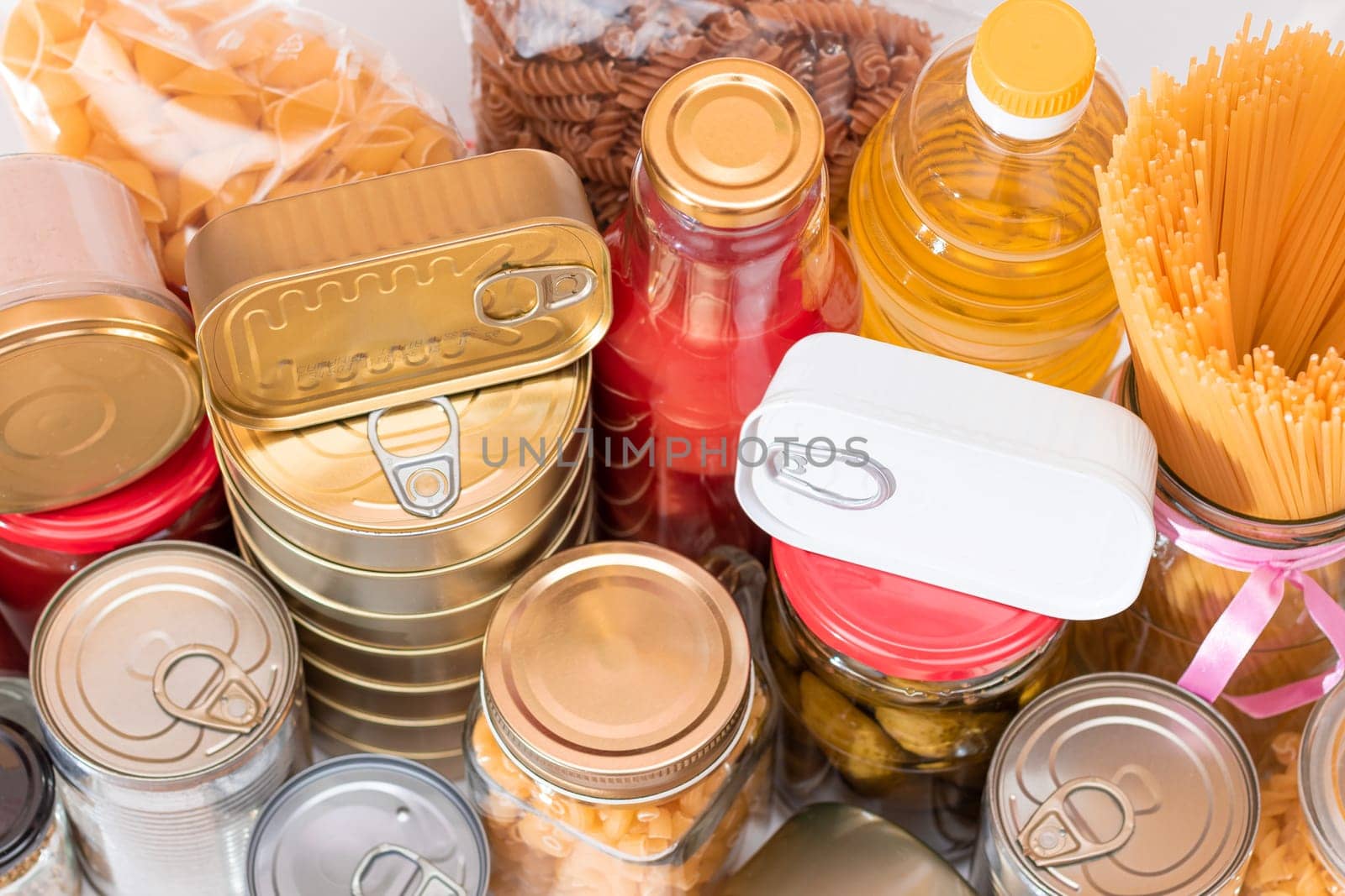 Food Reserves: Canned Food, Spaghetti, Pate, Tuna, Tomato Juice, Pasta, Fish and Grocery. Emergency Food Storage in Case of Crisis. Strategic Food Supplies