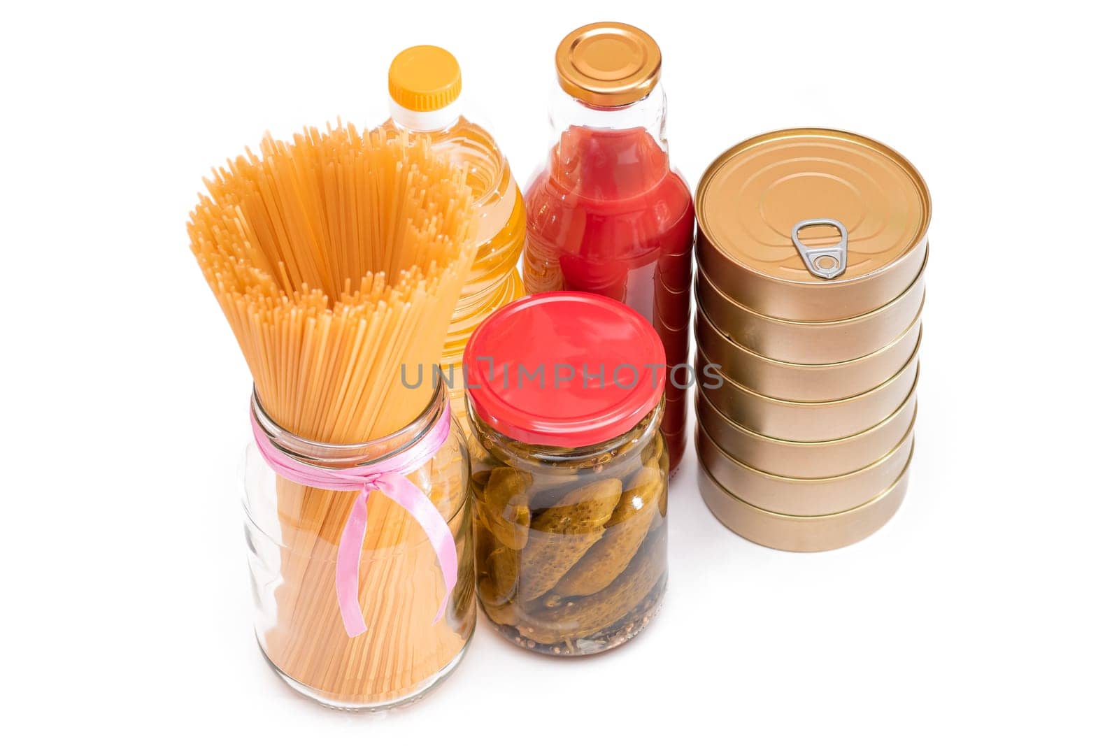 Food Reserves: Canned Food, Spaghetti, Pate, Tuna, Tomato Juice, Pasta, Fish and Grocery - Isolated on White Background. Emergency Food Storage in Case of Crisis. Strategic Food Supplies - Isolation