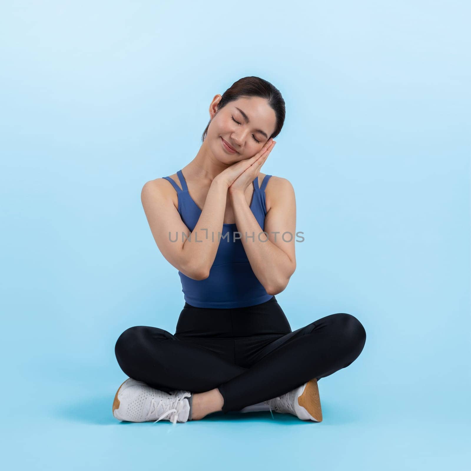 Full body asian woman in sportswear portrait, smiling and posing cheerful gesture. Workout training with attractive girl engage in her pursuit of healthy lifestyle. Isolated background Vigorous