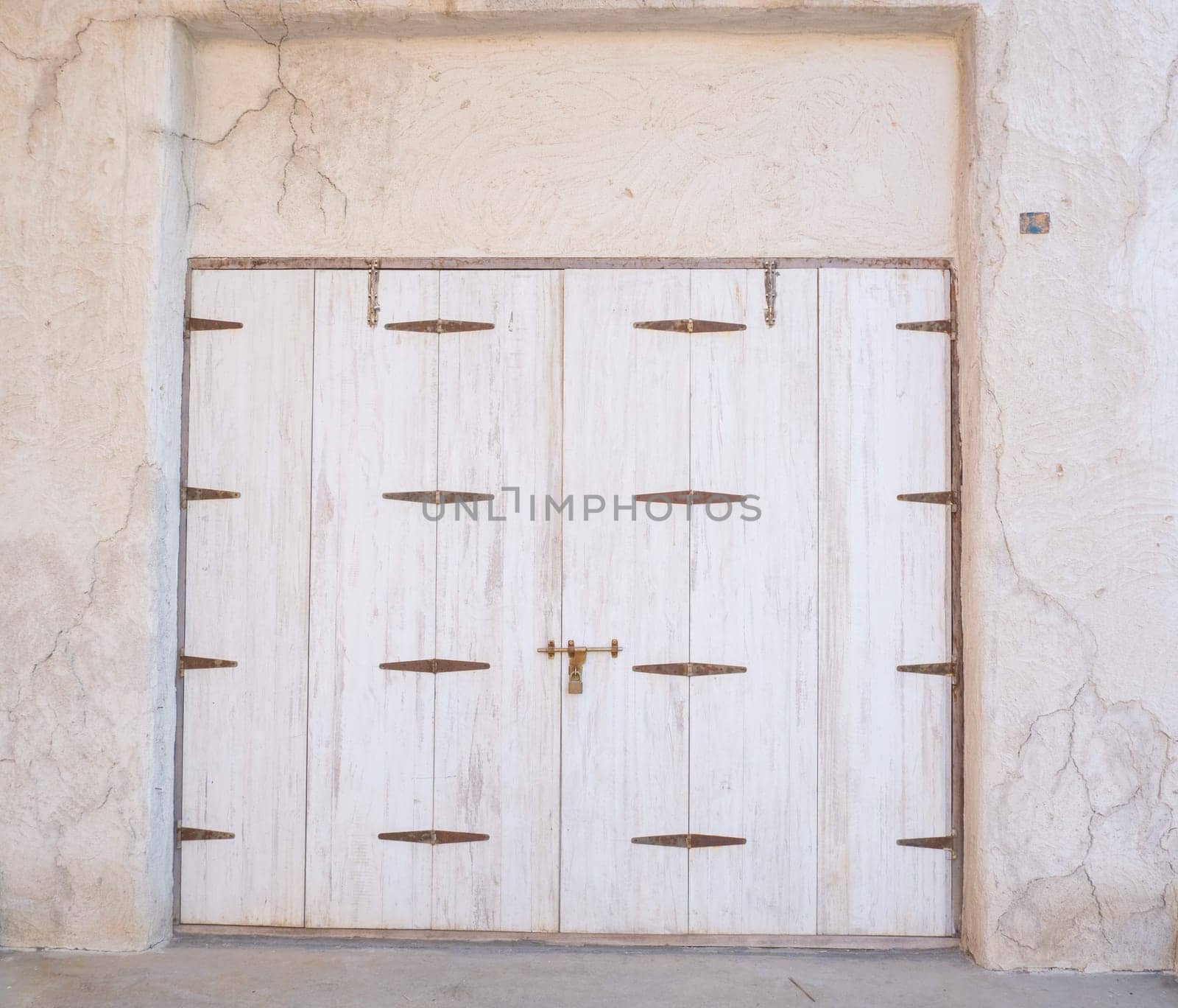 Arabic style carved wooden doors in Al Fahidi Historical District, Deira, Dubai, United Arab Emirates