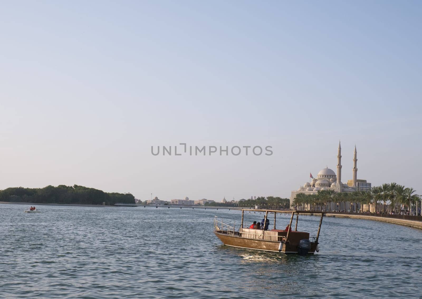 Sharjah, UAE, Feb 14, 2023: Al Majaz Quay, Khaled Lake with Al Noor Mosque in the background