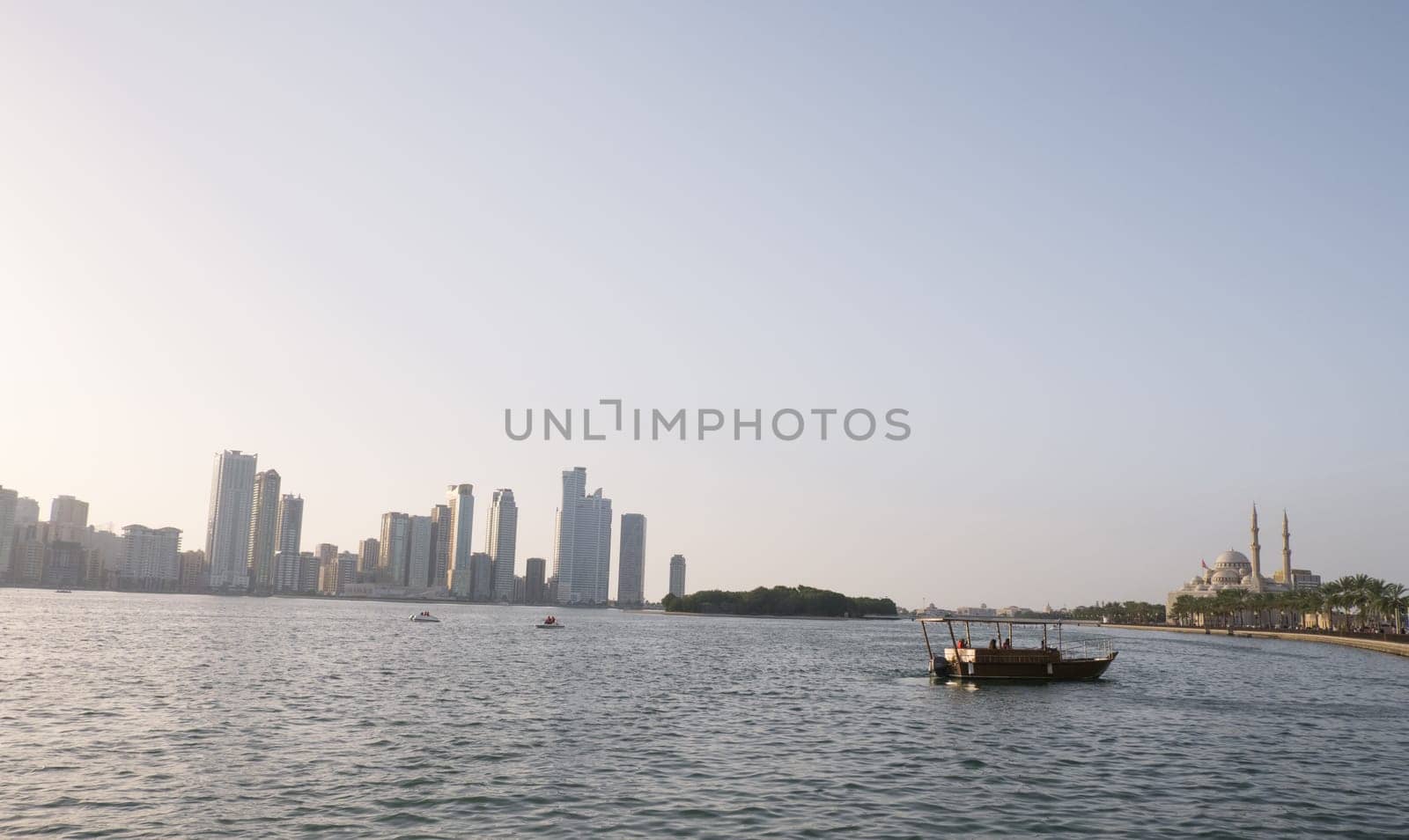 Sharjah, UAE, Feb 14, 2023: Al Majaz Quay, Khaled Lake with Al Noor Mosque in the background. by Ekaterina34