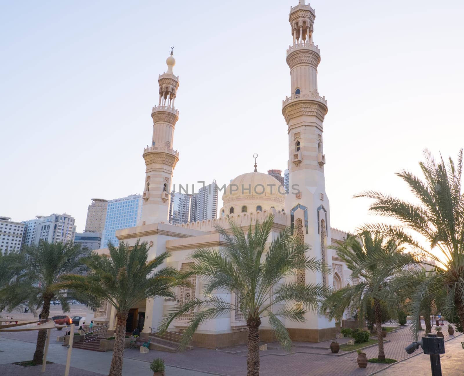 Sharjah, UAE, February 14, 2023 - Beautiful landscape mosque, a mosque of Islamic origin.