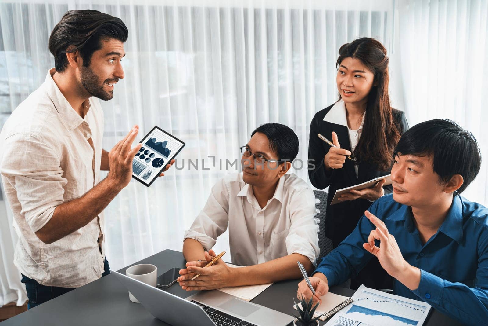 Group of diverse office worker employee working together on strategic business marketing planning in corporate office room. Positive teamwork in business workplace concept. Prudent