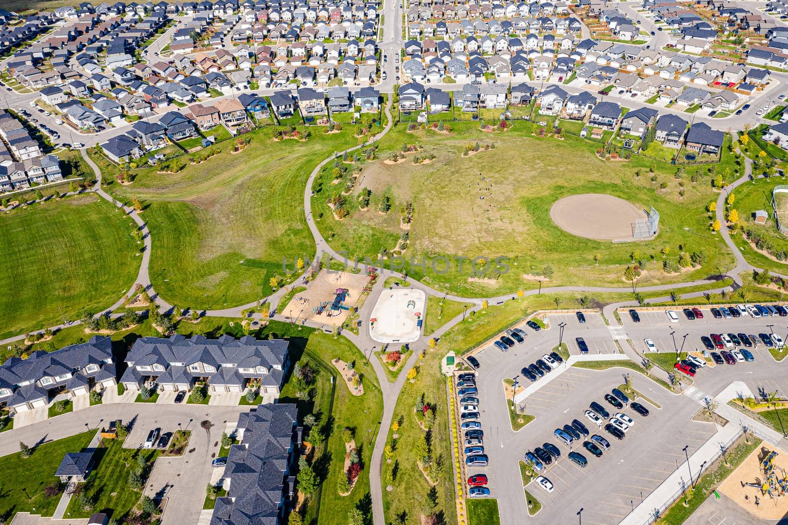 Discover the charm of Al Anderson Park in Saskatoon. This image highlights the park's vibrant sports fields, inviting picnic areas, and lush green spaces, a perfect community gathering spot.