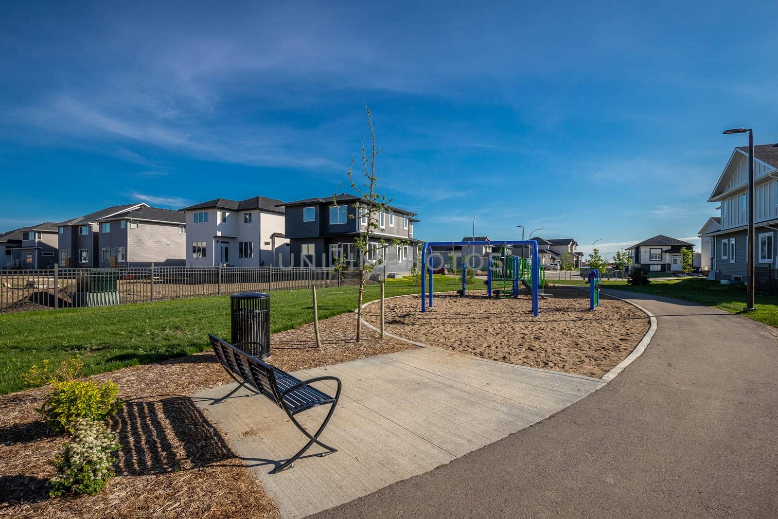 Explore the scenic beauty of Bidulka Park in Saskatoon. Captured here is the park's lush greenery, tranquil walking paths, and picturesque pond, a perfect spot for relaxation and nature walks.