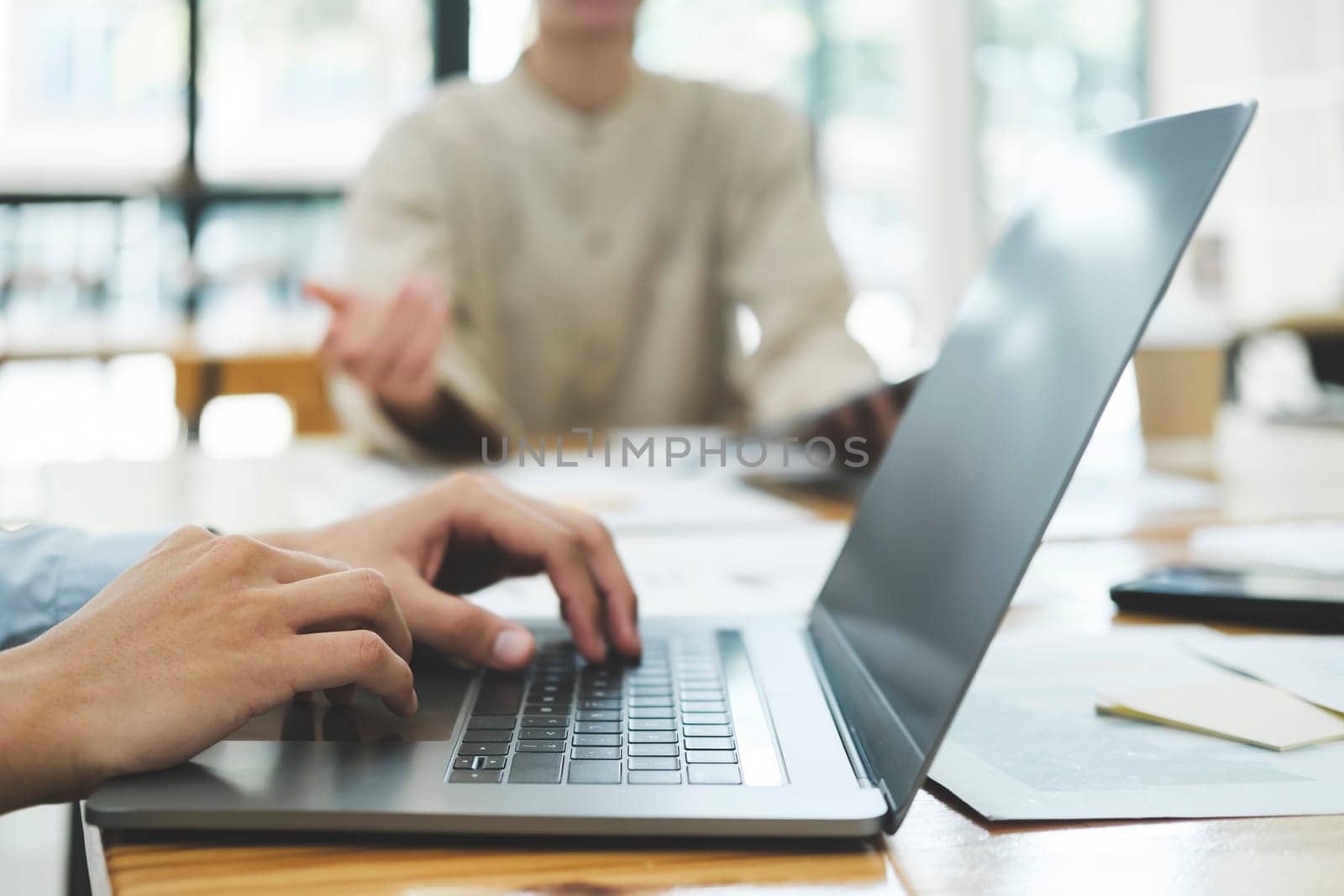 Business and network concept. Type search information from the Internet network. Businessman working with laptop computer on table in office.