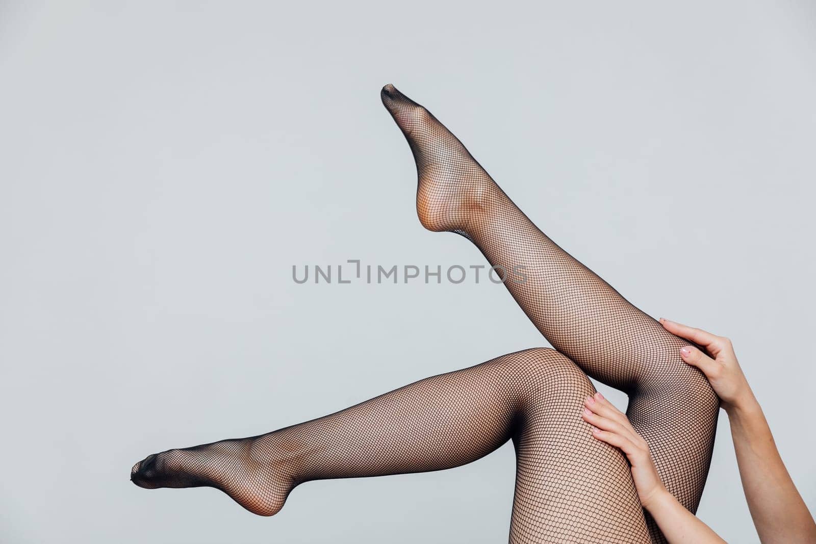 women's slender legs in black tights