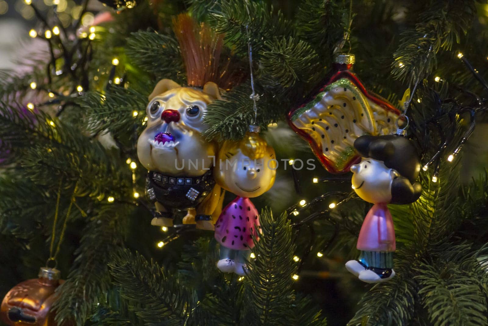 Christmas decorations dog and girl. Close-up.. High quality photo