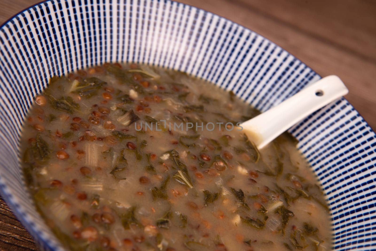 LEBANESE RECIPE FOR CHARD SOUP, LENTILS WITH LEMON, ADAS BI HAMOUD. High quality photo