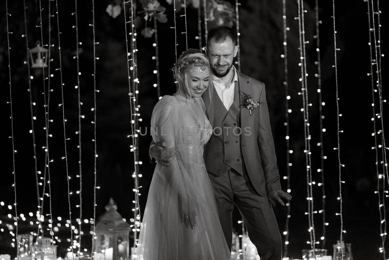 night wedding ceremony of the newlyweds in a country cottage by Andreua