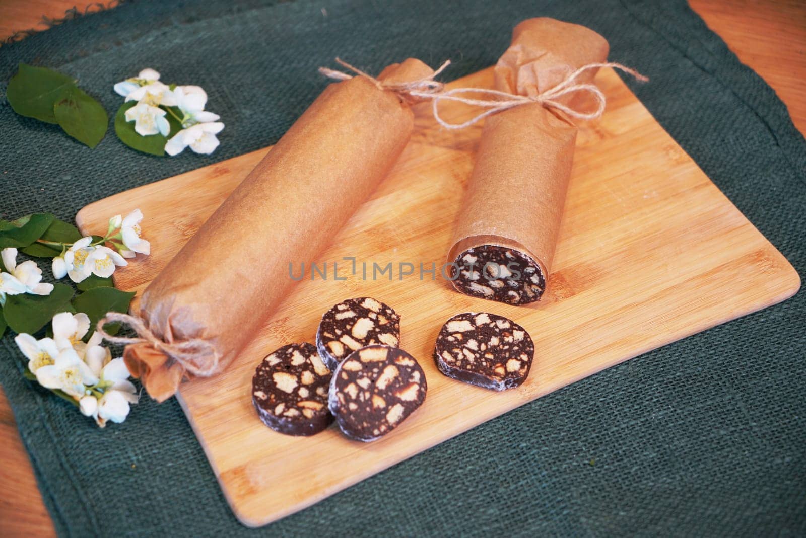 Beautiful chocolate salami on the table in 4k