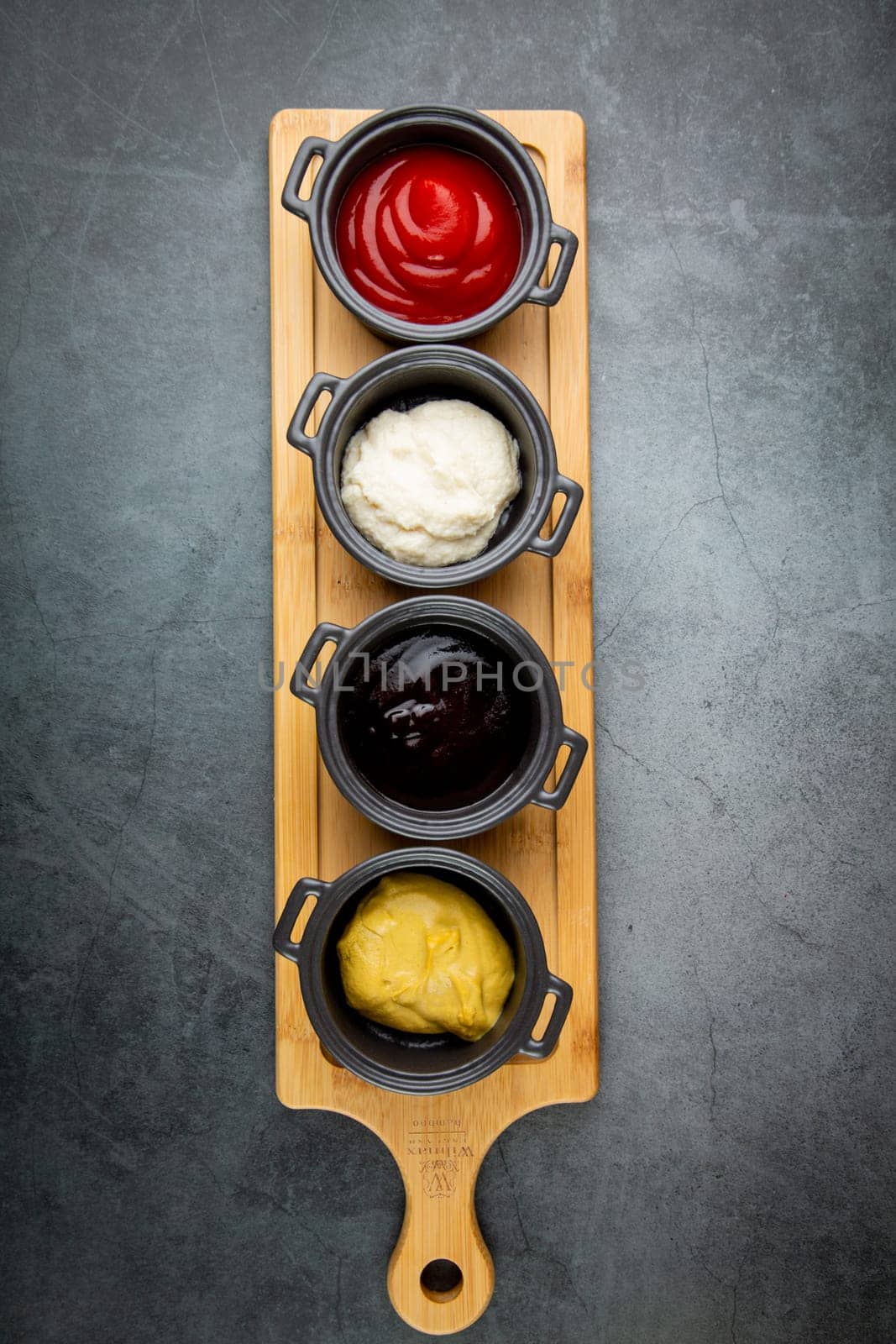 beer set with nuggets, breaded onion rings, fries and sauces