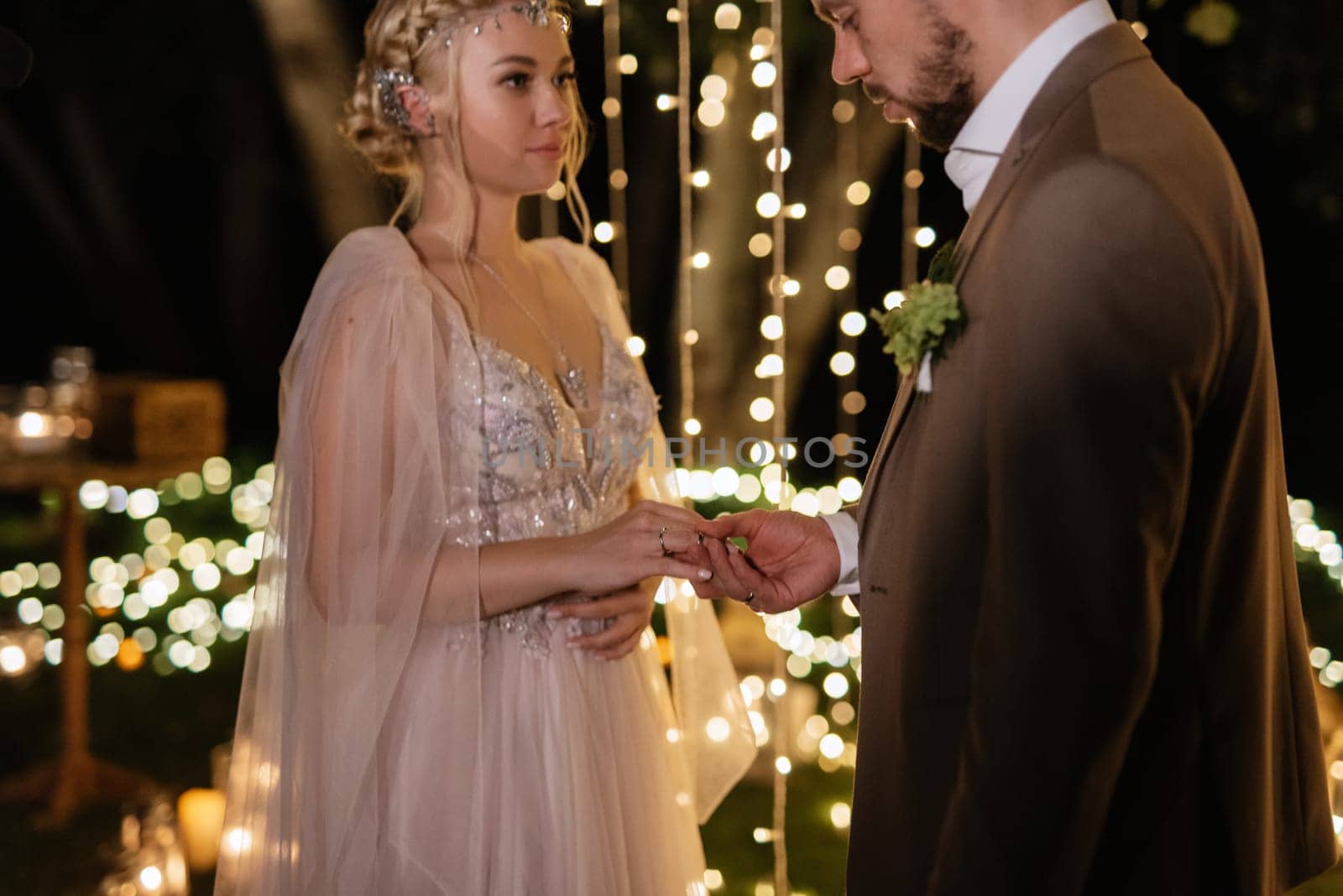 night wedding ceremony of the newlyweds in a country cottage by Andreua