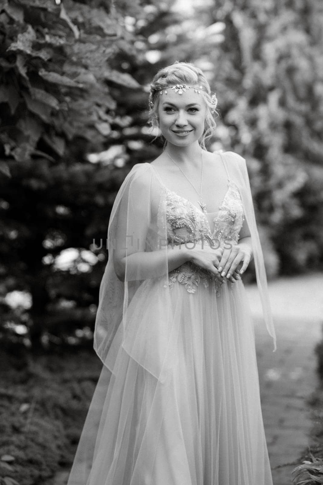 portrait of a happy bride in a light light dress in  wearing elven accessories by Andreua