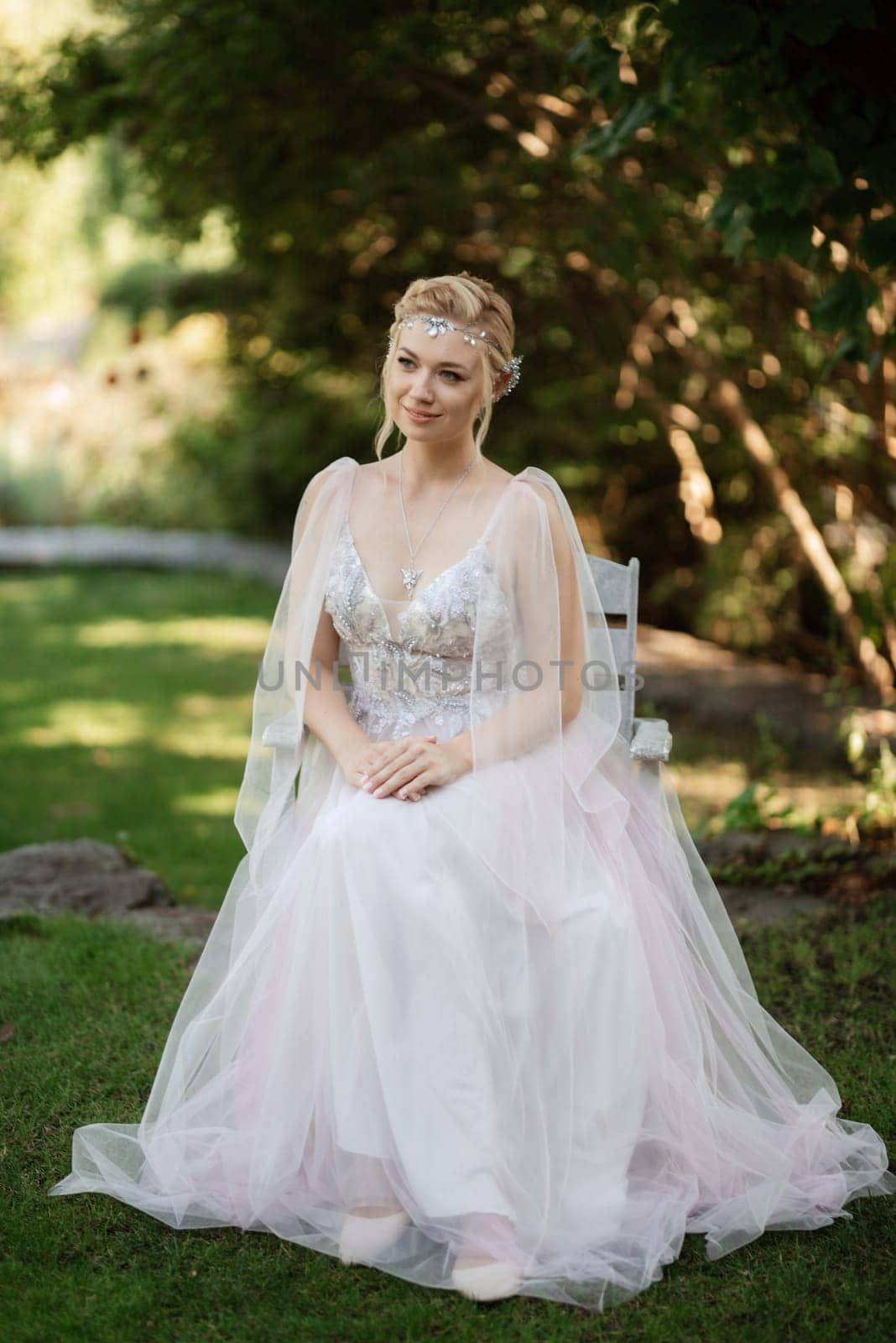 portrait of a happy bride in a light light dress in  wearing elven accessories by Andreua