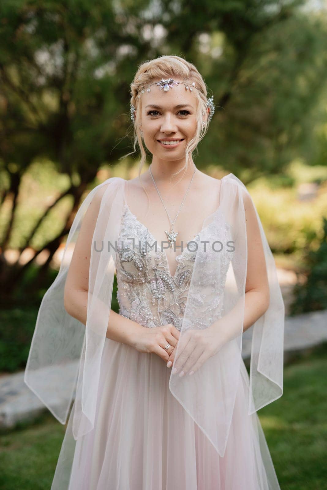 portrait of a happy bride in a light light dress in  wearing elven accessories by Andreua