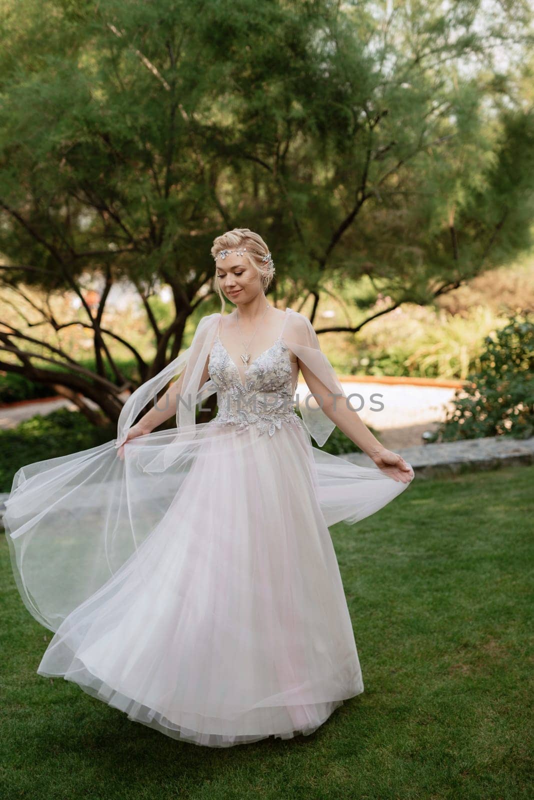 portrait of a happy bride in a light light dress in  wearing elven accessories by Andreua