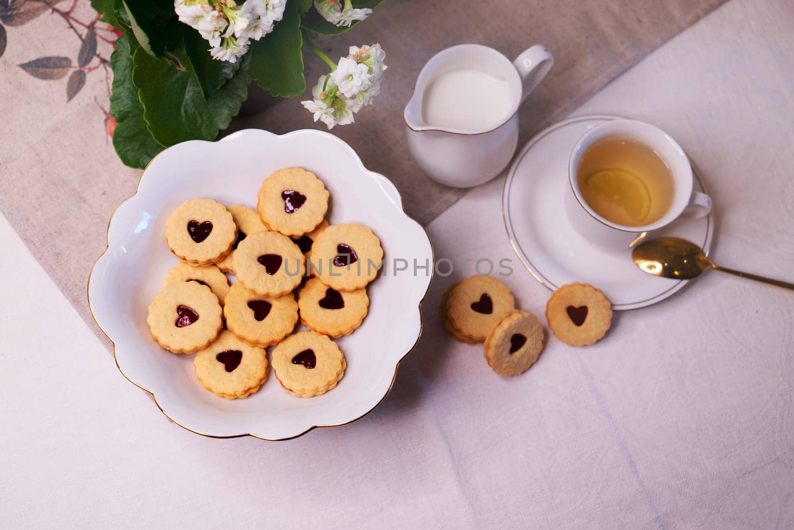 Cookies with jam filling for tea by studiodav