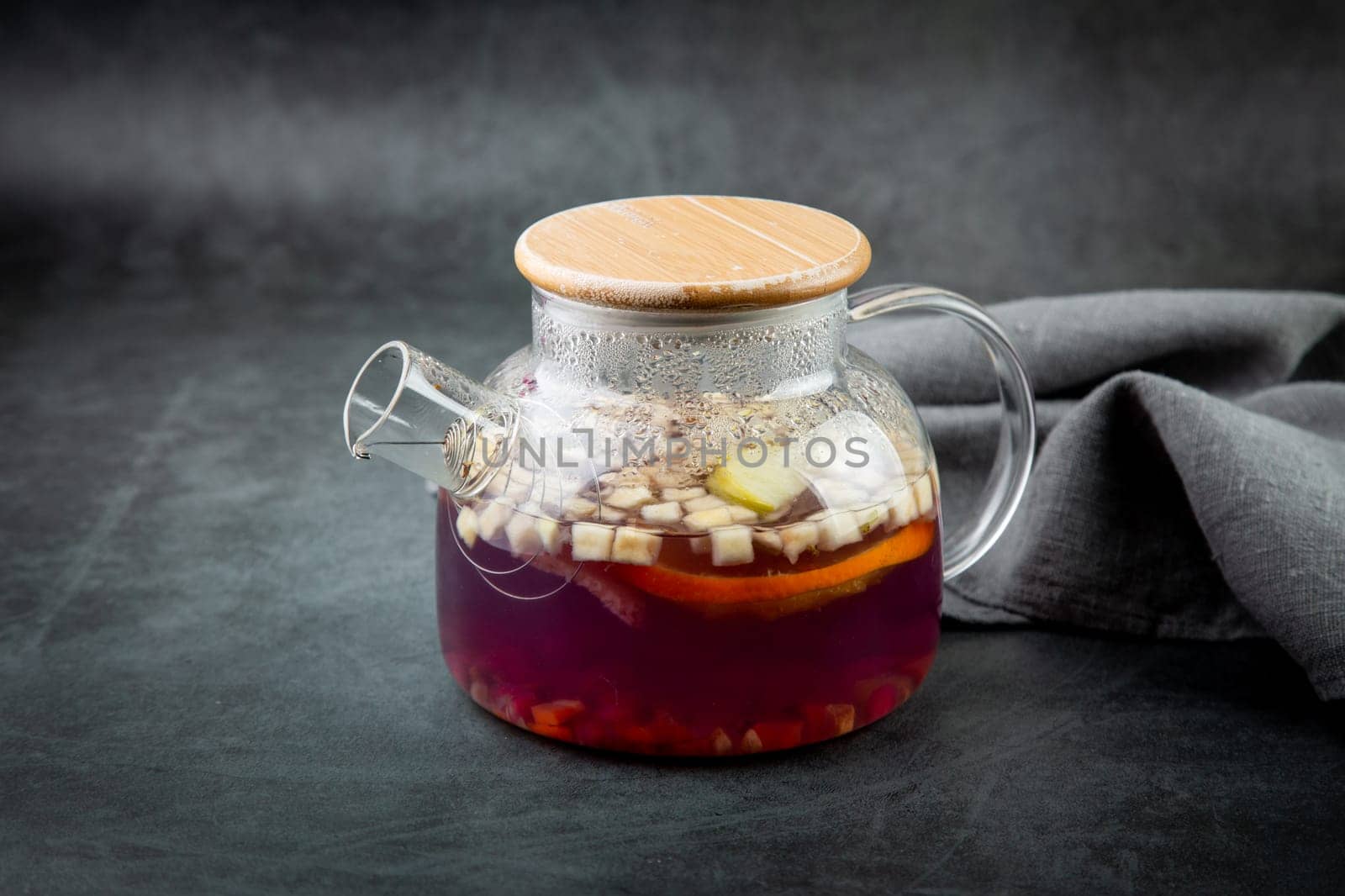 hot homemade tea with cinnamon, lemon and mint