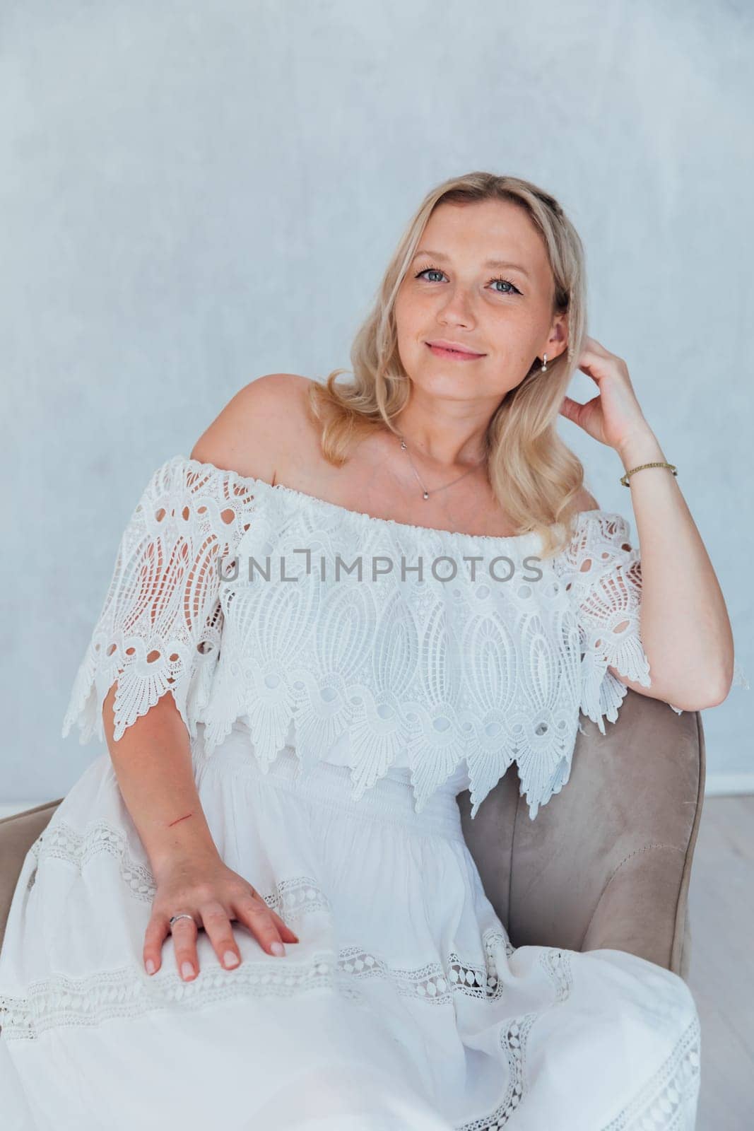 blonde bride woman in summer knitted dress