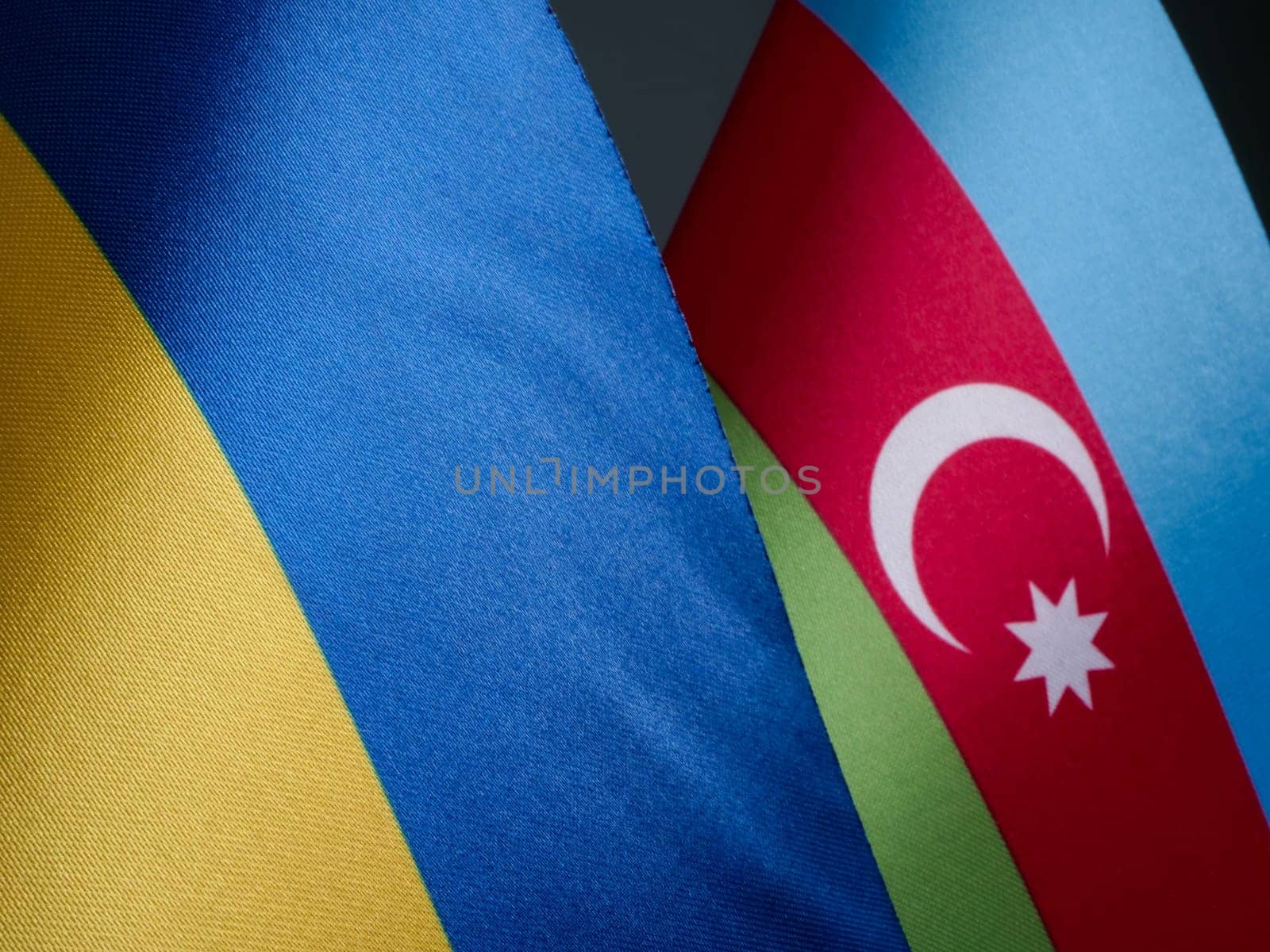 Close-up of the flags of Ukraine and Azerbaijan.