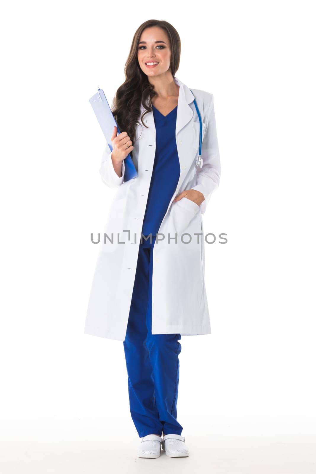Smiling female doctor with a folder in uniform isolated on white background