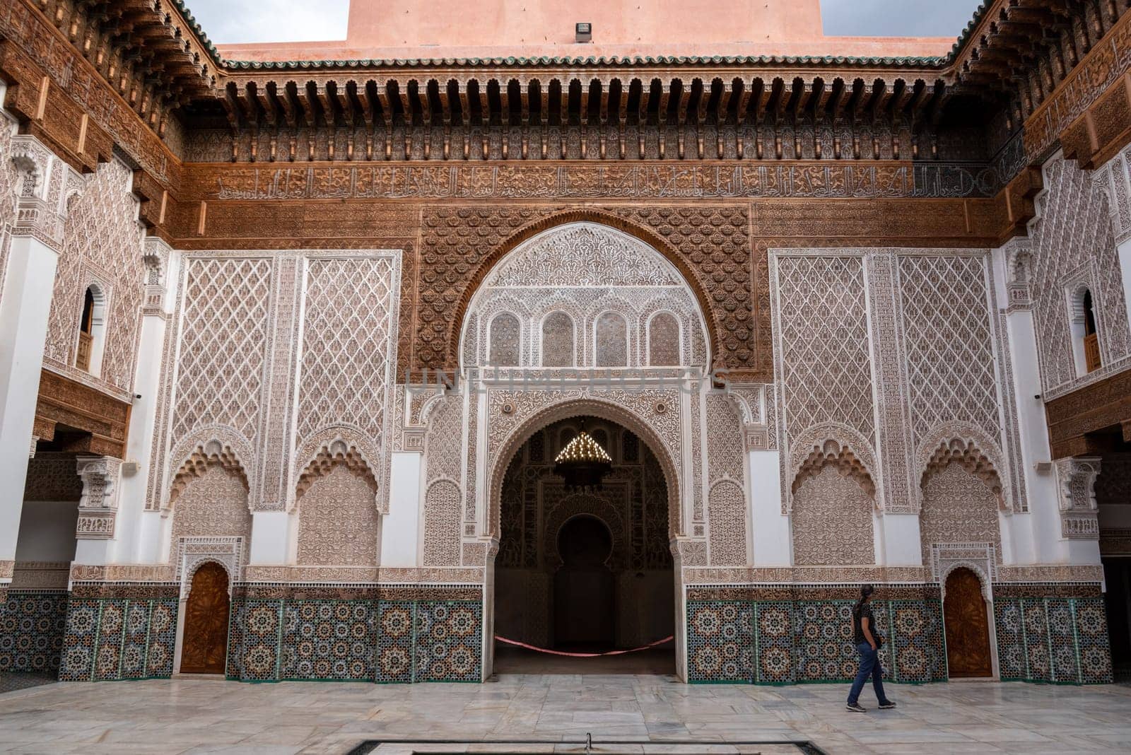 MARRAKECH, MOROCCO - APRIL 18, 2023 - Famous Medersa Ben Youssef in the medina of Marrakech in Morocco by imagoDens