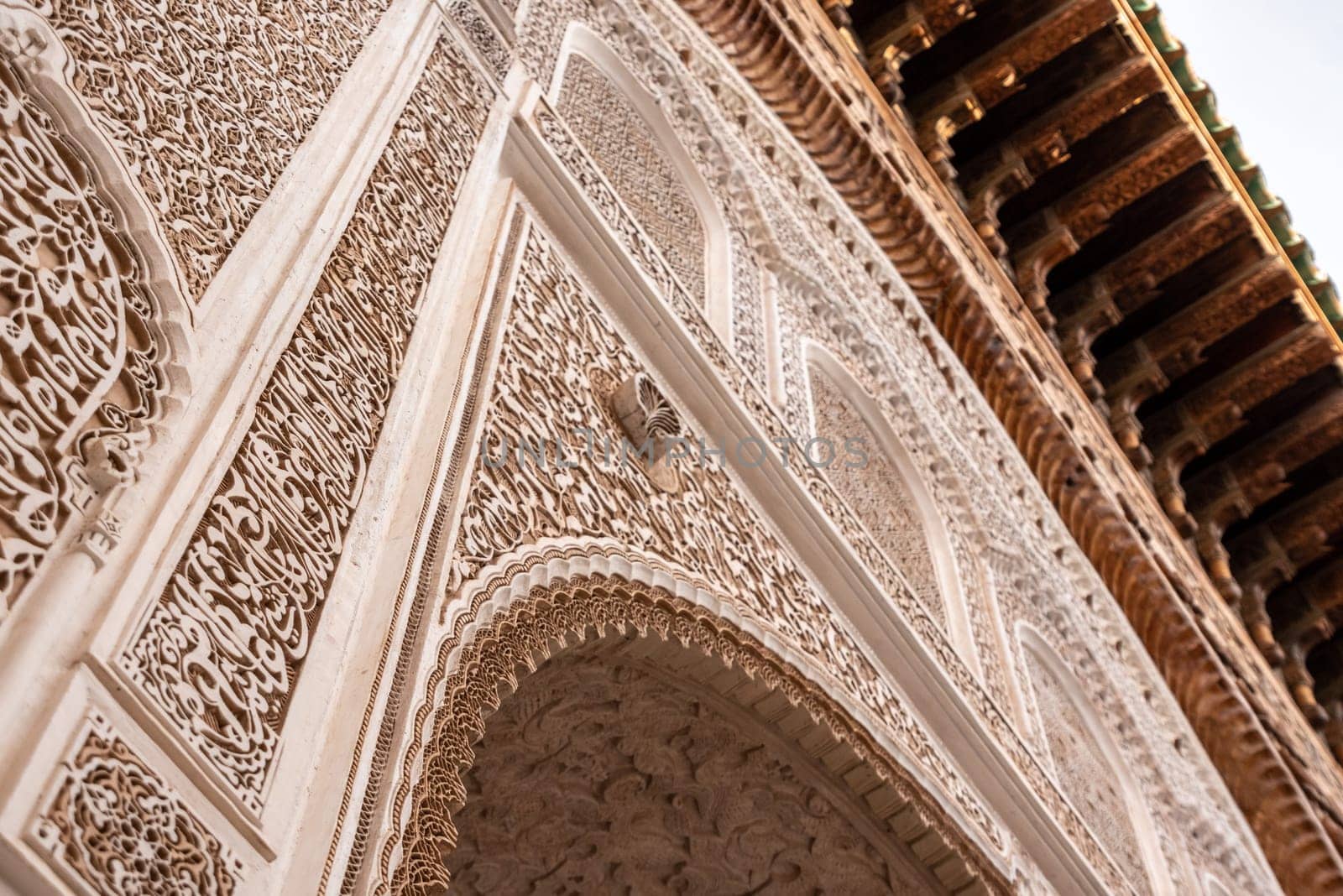 MARRAKECH, MOROCCO - APRIL 18, 2023 - Famous Madrassa Ben Youssef in the medina of Marrakech in Morocco by imagoDens