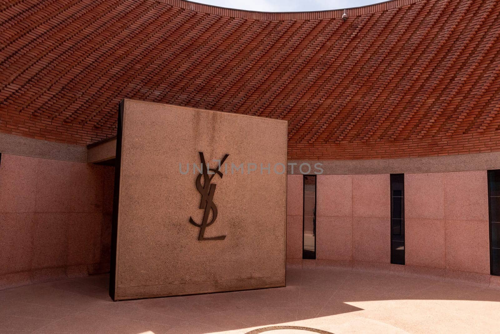 MARRAKECH, MOROCCO - APRIL 19, 2023 - Initals of Yves Saint Laurent in the patio of his museum in Marrakech by imagoDens
