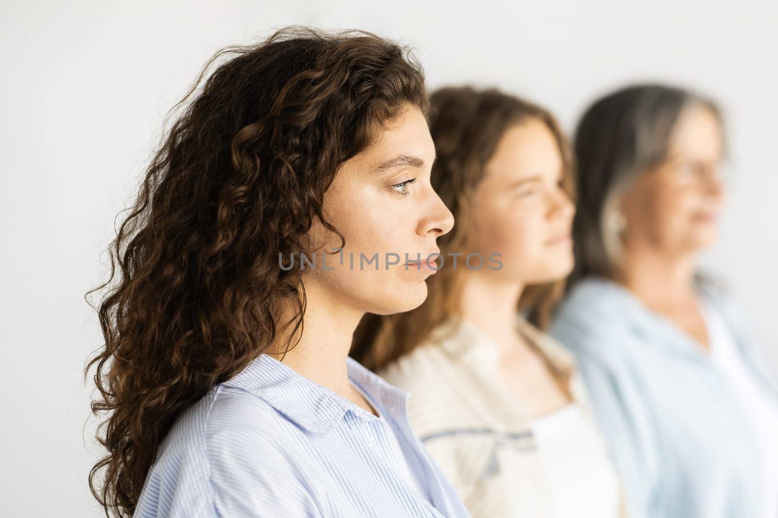 Calm serious caucasian different women, isolated on white studio background, close up. Genetic, relationship and family, beauty care, lifestyle and female generation, ad and offer