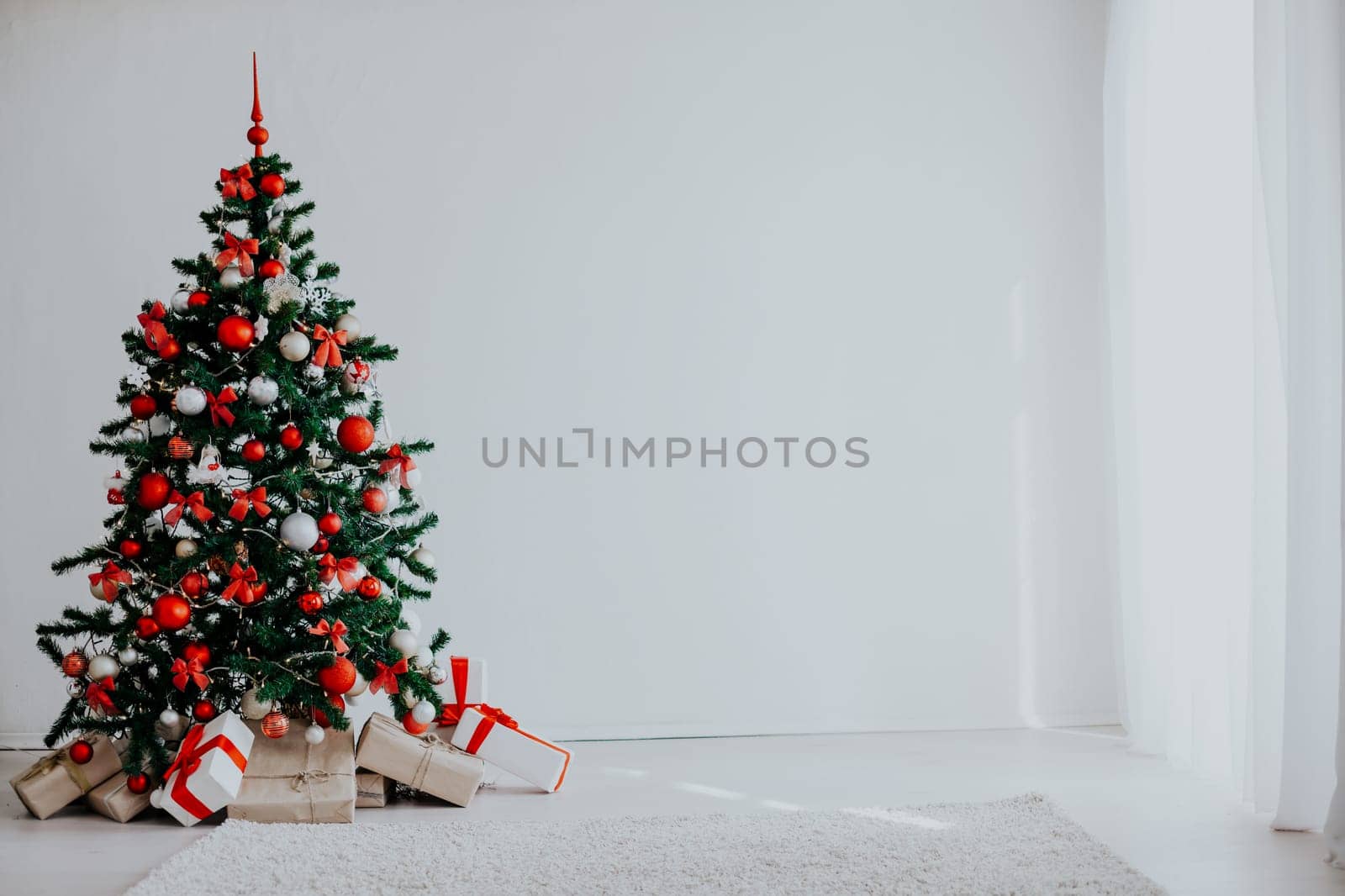 Christmas tree with red decorations new year gifts 2018