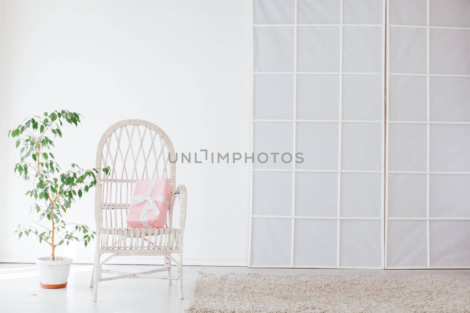 vintage chair in the interior of an empty white room