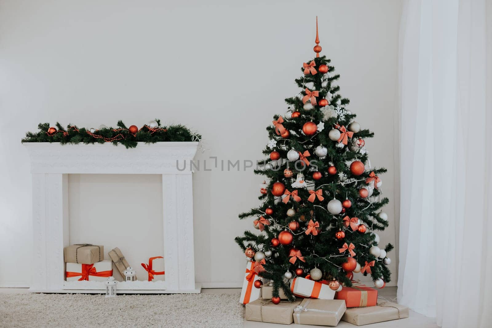 room decorated for the Christmas holidays new year tree gifts 2018 2019