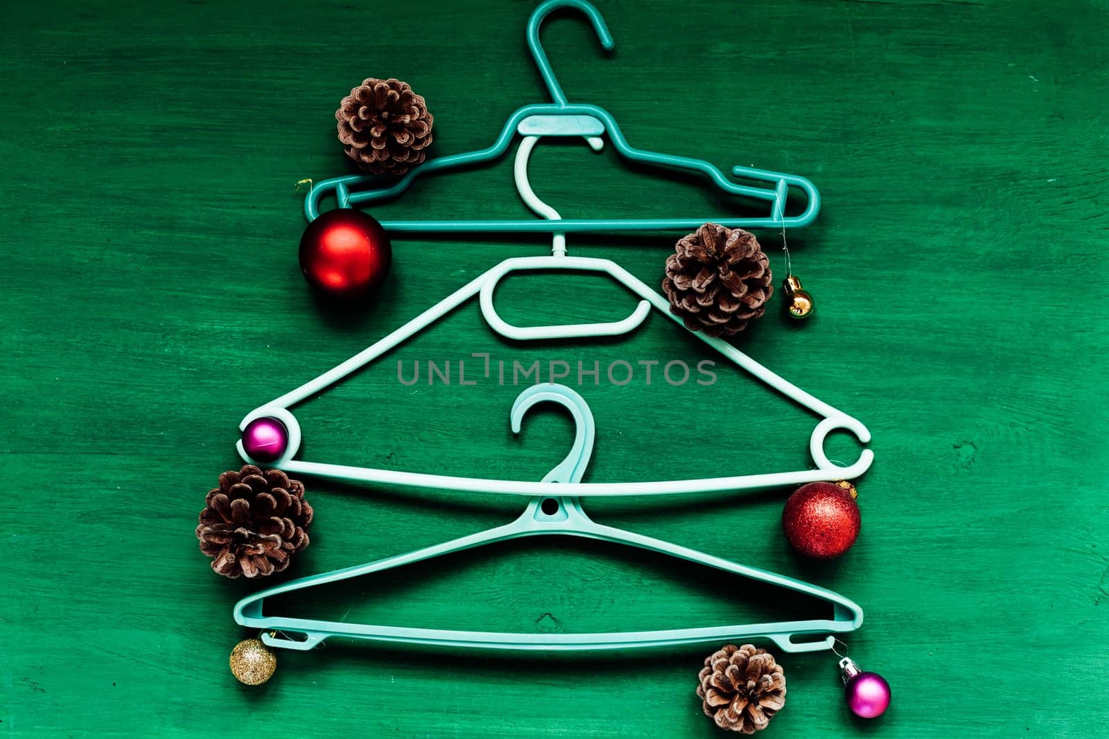 Hanger for clothes Christmas background Christmas tree gifts new year by Simakov