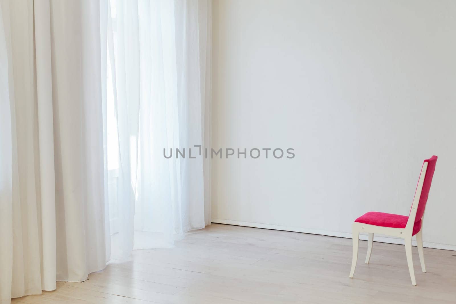 one red chair in the interior of an empty white office by Simakov