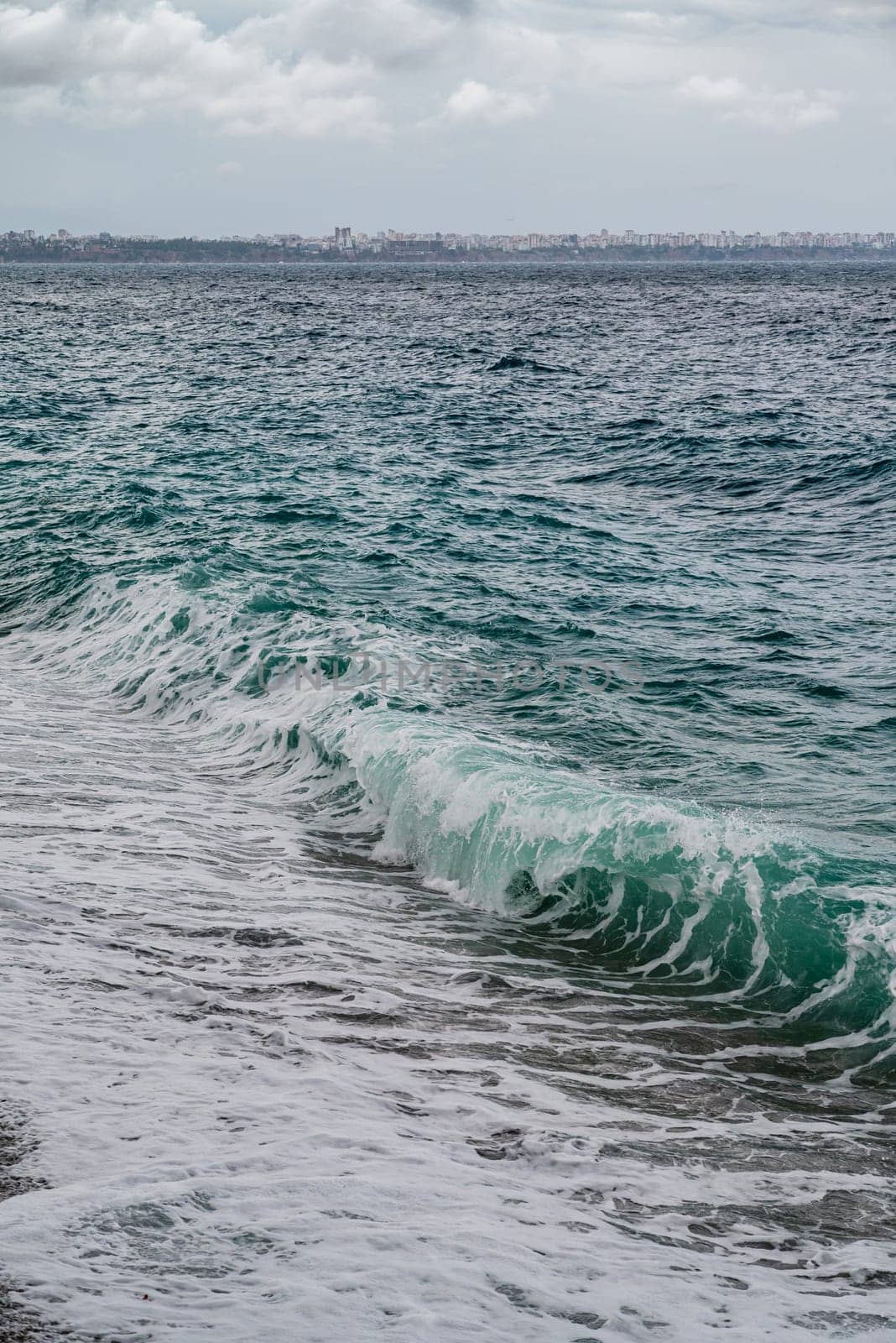 Big waves hitting the Konyaalti coast on a stormy day