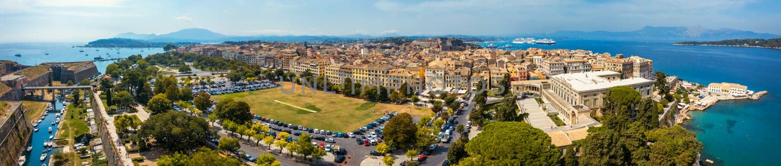 Panoramic view of Kerkyra, capital of Corfu island, Greece. Aerial drone view of Kerkyra with beautiful buildings during summer sunny day. Corfu island, Greece. 