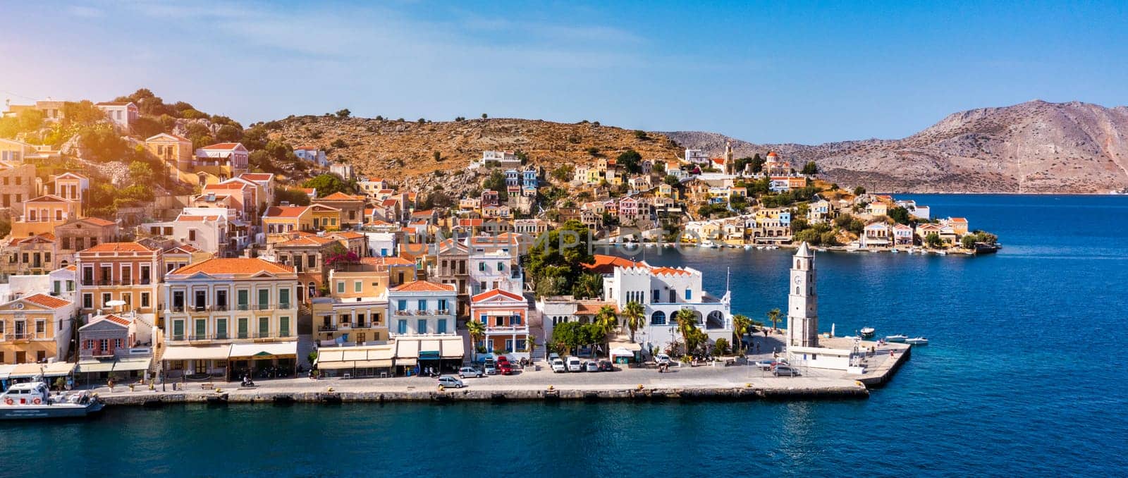 Aerial view of the beautiful greek island of Symi (Simi) with colourful houses and small boats. Greece, Symi island, view of the town of Symi (near Rhodes), Dodecanese.