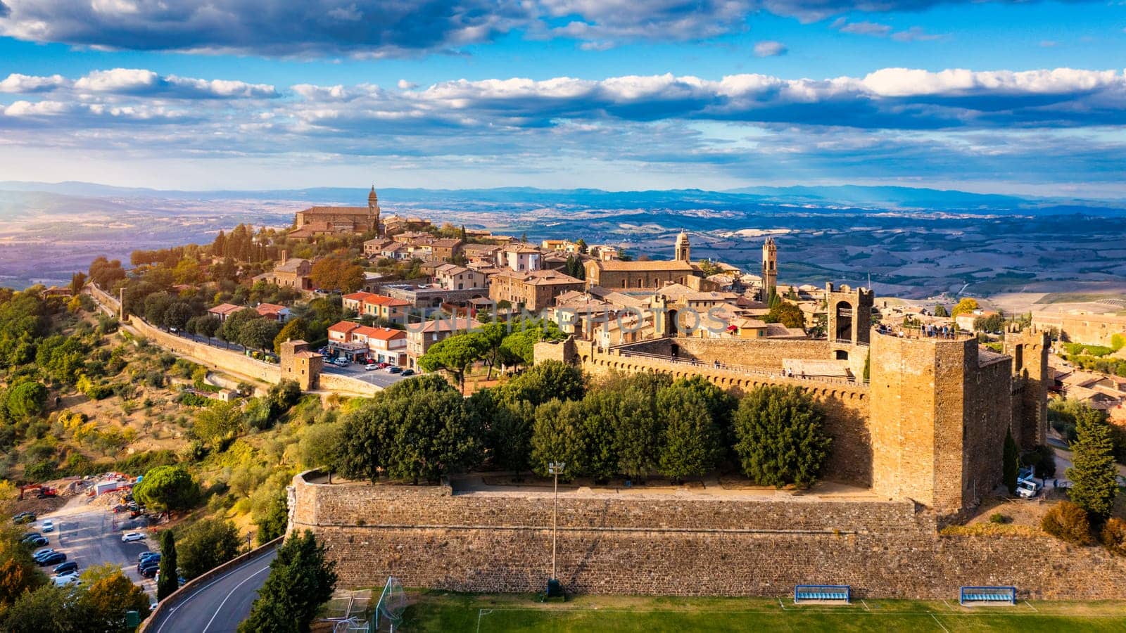 View of Montalcino town, Tuscany, Italy. The town takes its name from a variety of oak tree that once covered the terrain. View of the medieval Italian town of Montalcino. Tuscany