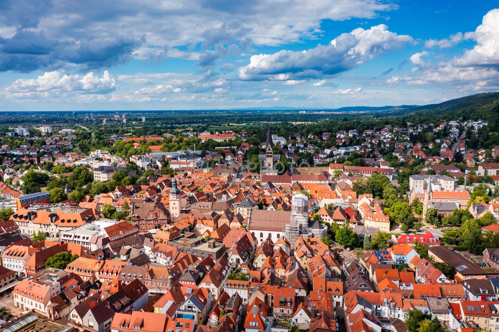 Old city of Ettlingen in Germany with a river and a church. View of a central district of Ettlingen, Germany, with a river and a bell tower of a church. Ettlingen, Baden Wurttemberg, Germany.